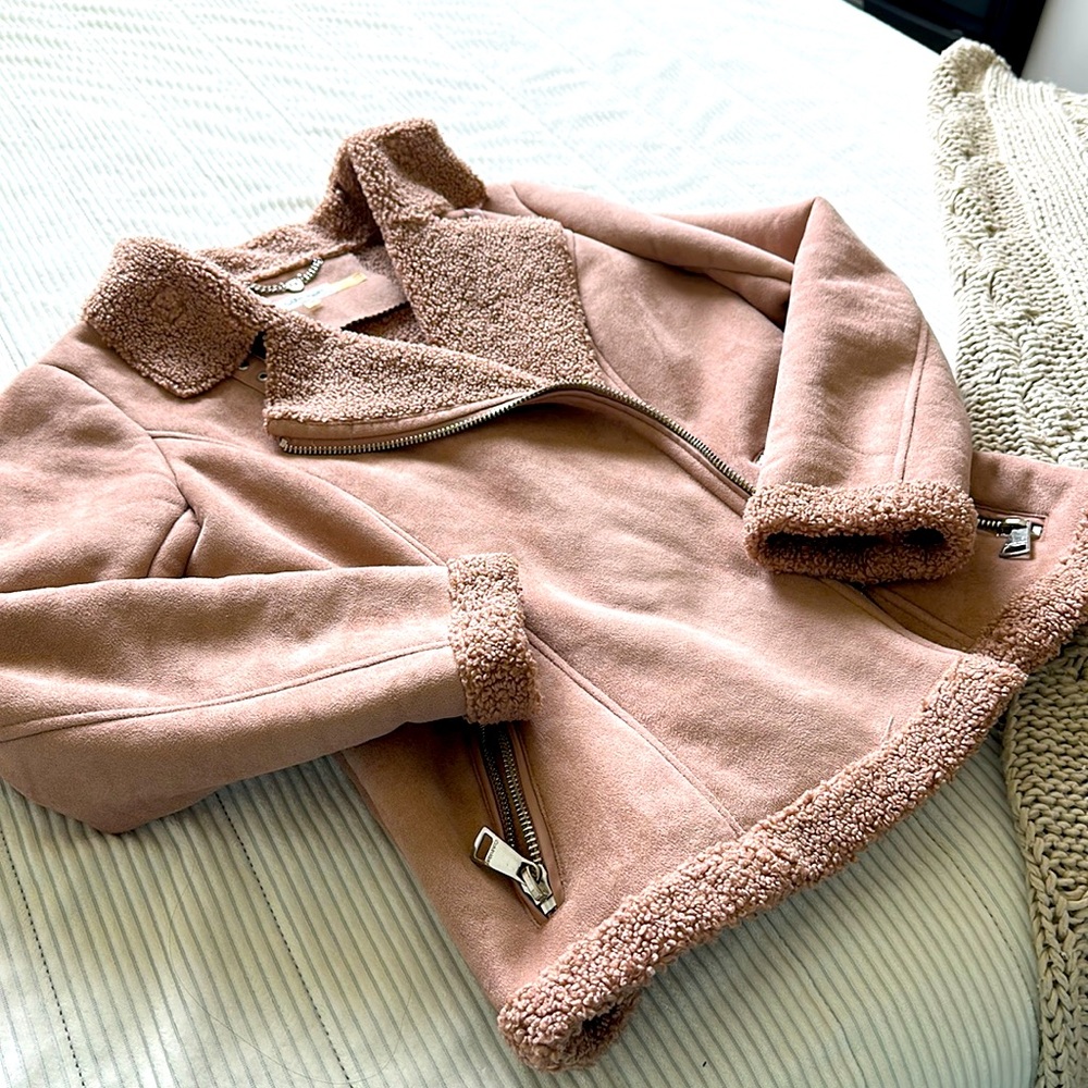 Size M, pink color with silver details.